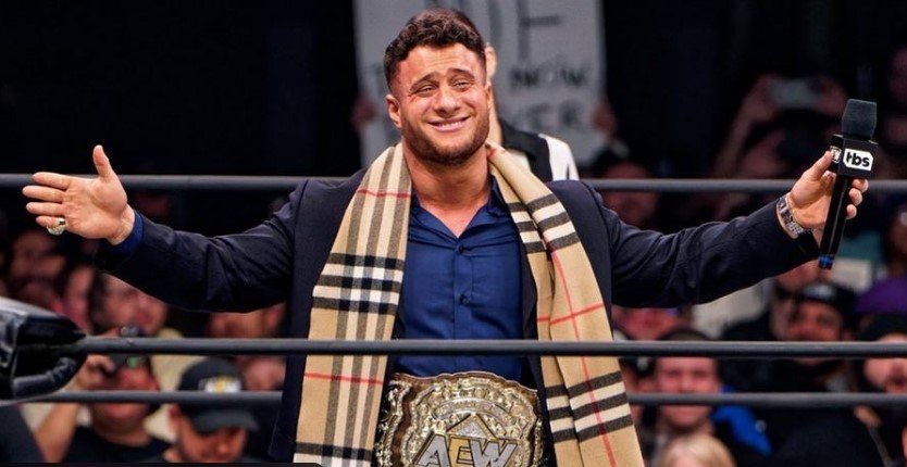 MJF celebrating in the ring with AEW World Title